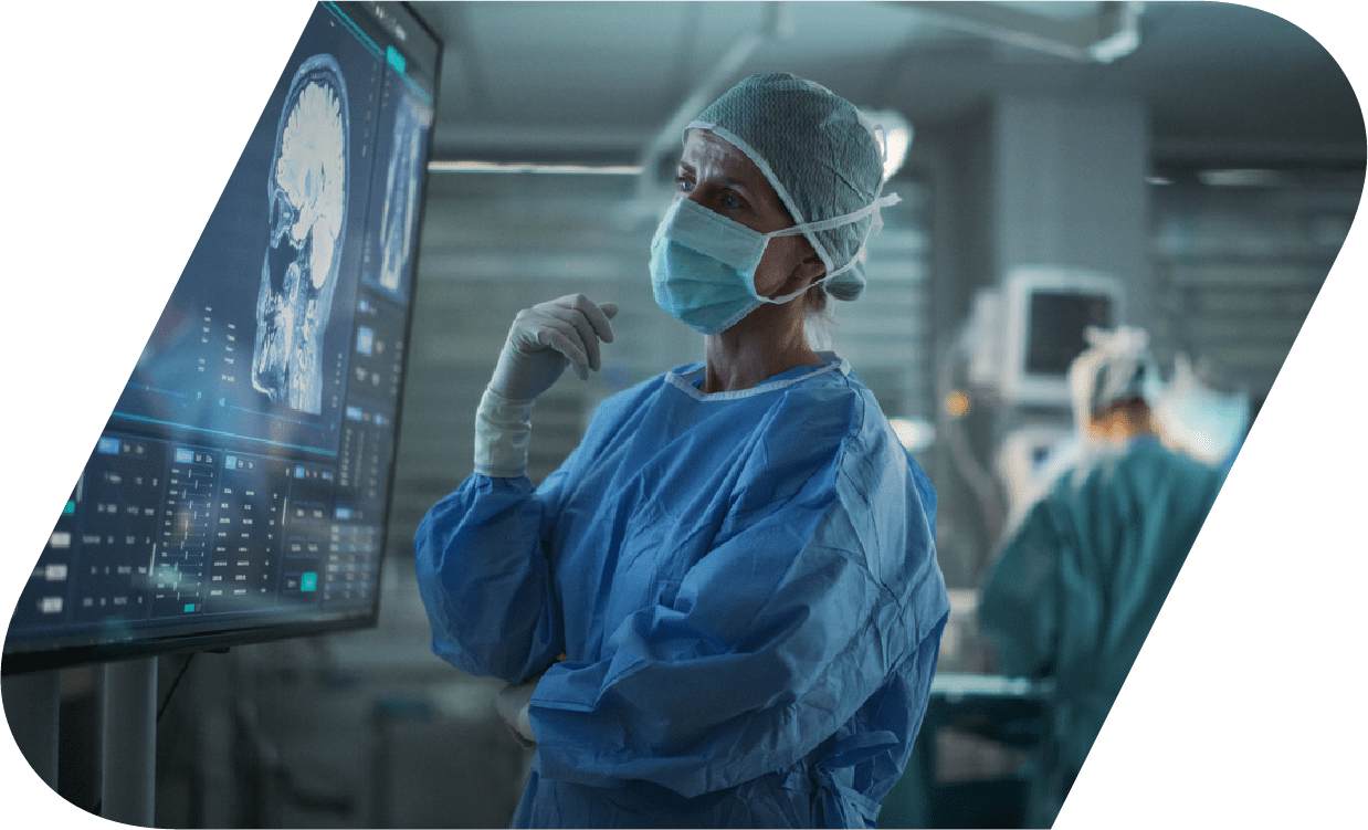 A brain surgeon assessing a brain scan.