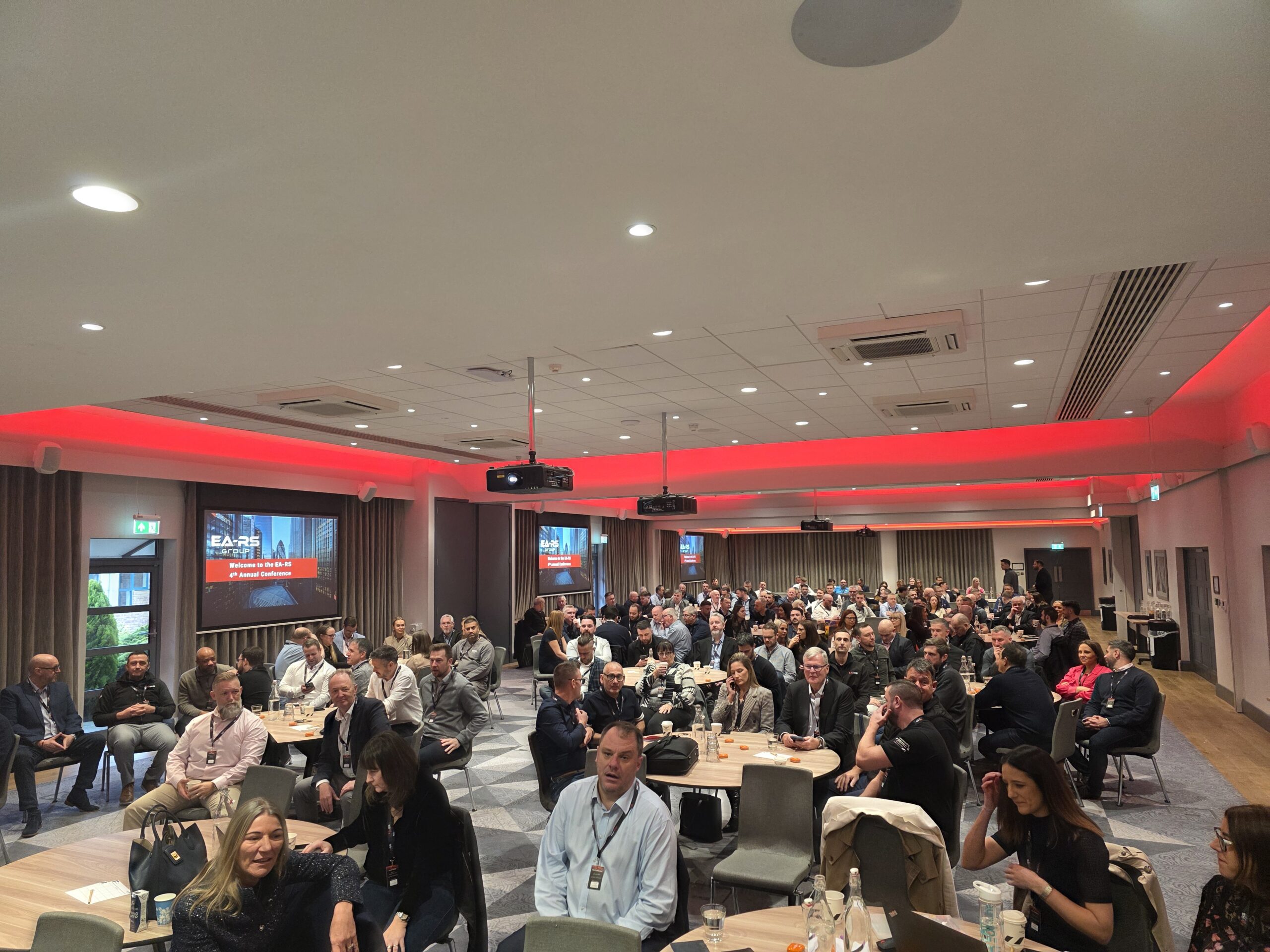 Guests sitting at a conference are waiting to happen.