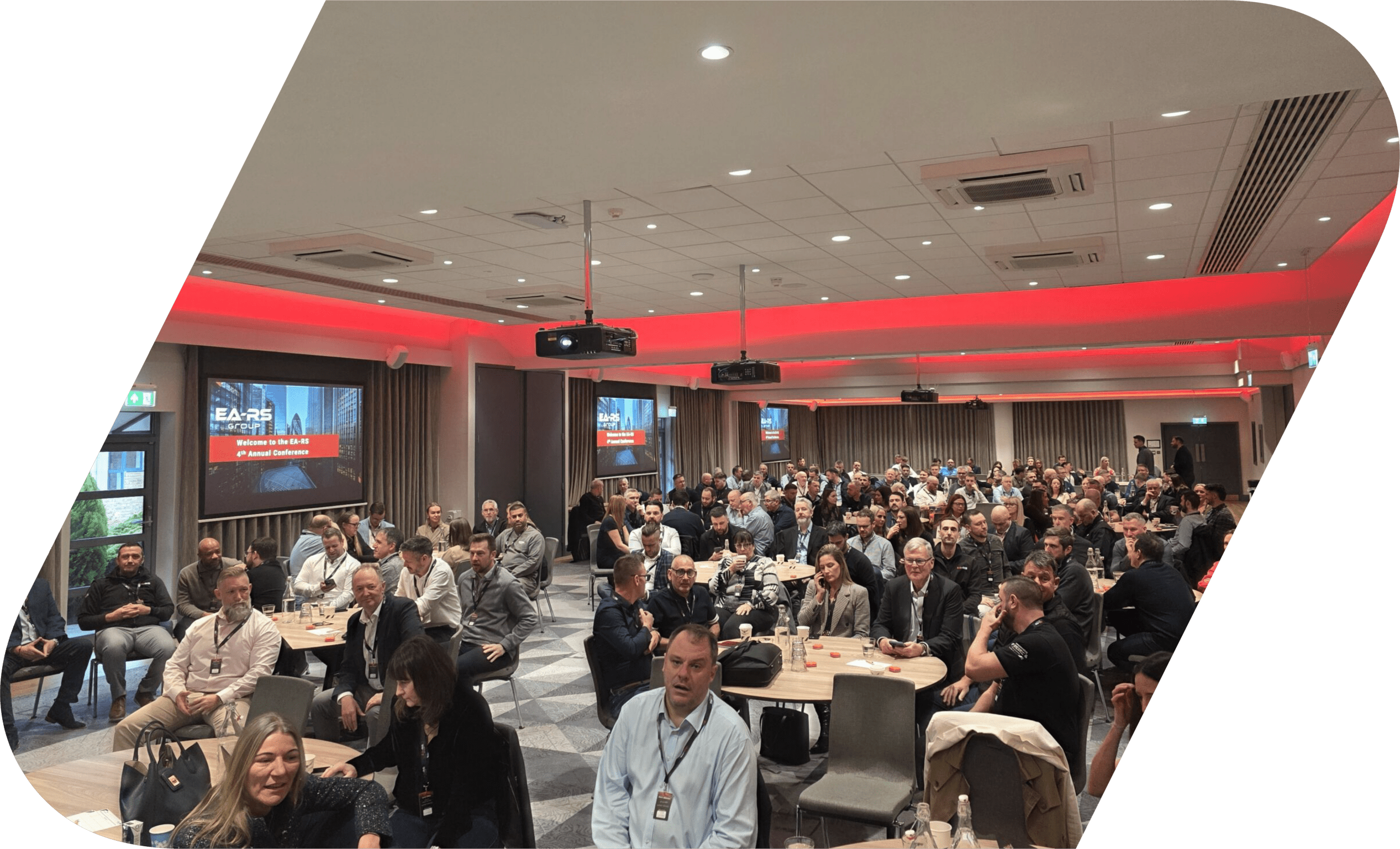 A conference room filled with attendees.